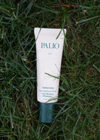 Tube of Palio cream lying on grass