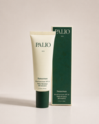 A tube of PALIO NO.01 sunscreen stands in front of its matching dark green and cream packaging box on a clean, light beige background.